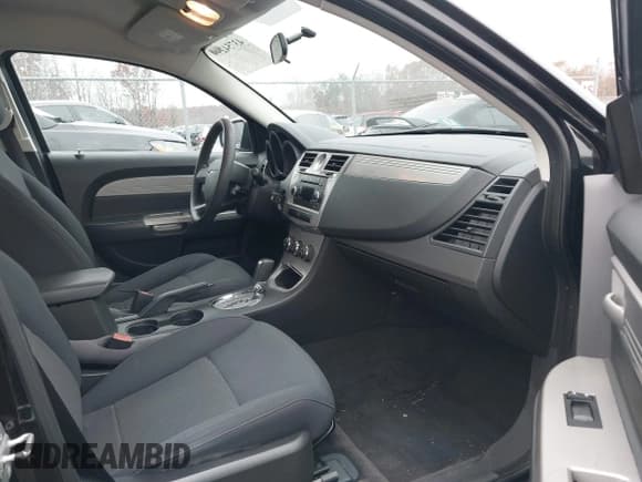 ✅ 2010 Chrysler Sebring Touring • VIN: 1C3CC4FB5AN148335 • Lot: 43754299. Listed on IAAI with 176,503 mi. Free auction sales archive from the USA and detailed vehicle history report at DreamBid. Image 5.