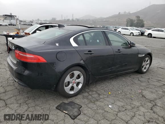 ✅ 2018 Jaguar XE 25t • VIN: SAJAR4FX7JCP37106 • Лот: 85785675. Опубликован ранее на Copart с пробегом 119 258 миль. Бесплатный доступ к архиву аукционных продаж из США и подробный отчёт об истории автомобиля на DreamBid. Изображение 3.