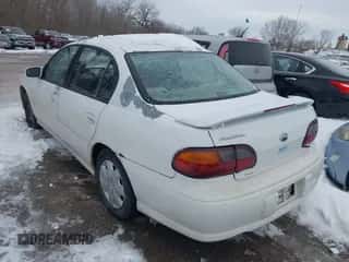 1998 Chevrolet Malibu z VIN 1G1ND52M6WY148731, wystawiony jako IAAI lot #41297219 z przebiegiem 228 054 mil mil oraz . Historia ofert i sprzedaży dostępna na DreamBid. Obrazek 3.