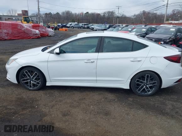 ✅ 2019 Hyundai Elantra Sport • VIN: KMHD04LB3KU841923 • Lot: 41887656. Listed on IAAI with 64,454 mi. Free auction sales archive from the USA and detailed vehicle history report at DreamBid. Image 14.