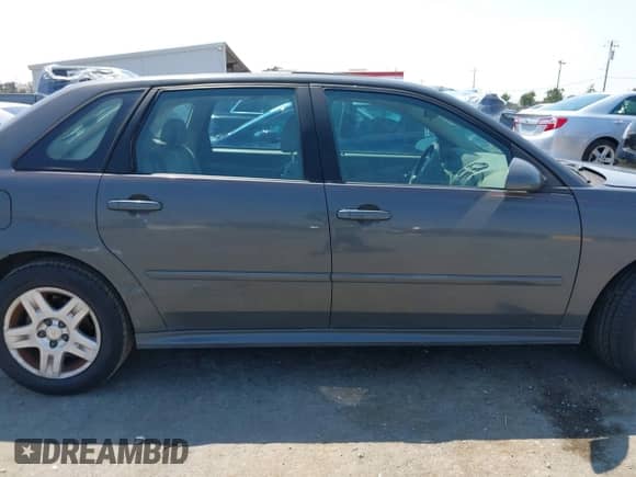 2007 Chevrolet Malibu Maxx LT z VIN 1G1ZT68N57F143799, wystawiony jako IAAI lot #42725847 z przebiegiem 143 982 mil mil oraz . Historia ofert i sprzedaży dostępna na DreamBid. Obrazek 13.