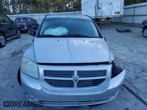✅ 2008 Dodge Caliber SE • VIN: 1B3HB28B18D558783 • Лот: 82993104. Опубликован ранее на Copart с пробегом Не указан. Бесплатный доступ к архиву аукционных продаж из США и подробный отчёт об истории автомобиля на DreamBid. Изображение 5.