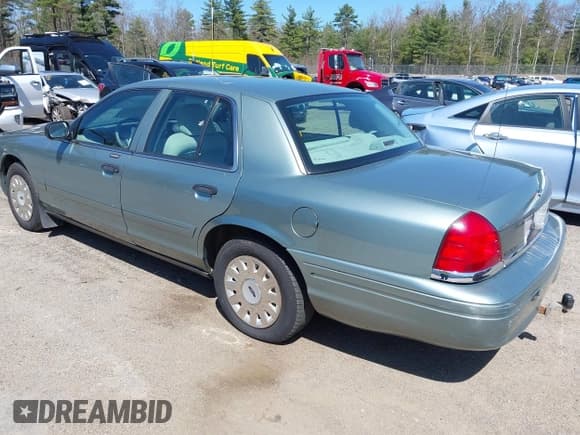 ✅ 2005 Ford Crown Victoria Standard • VIN: 2FAFP73W05X118255 • Lot: 42112937. Listed on IAAI with 71,481 mi. Free auction sales archive from the USA and detailed vehicle history report at DreamBid. Image 3.