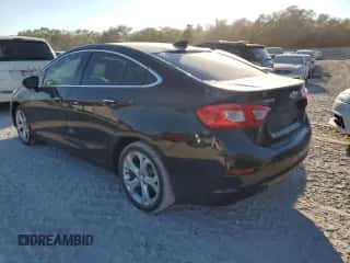 2016 Chevrolet Cruze Premier z VIN 1G1BG5SM3G7278712, wystawiony jako Copart lot #62579392 z przebiegiem Nie podano mil oraz . Historia ofert i sprzedaży dostępna na DreamBid. Obrazek 3.
