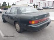 ✅ 1994 Toyota Camry LE • VIN: 4T1GK12E7RU057451 • Лот: 42417533. Опубликован ранее на IAAI с пробегом 421 184 миль. Бесплатный доступ к архиву аукционных продаж из США и подробный отчёт об истории автомобиля на DreamBid. Изображение 3.