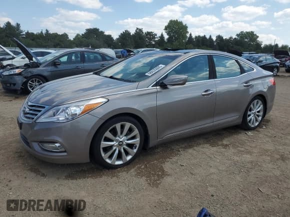 ✅ 2013 Hyundai Azera • VIN: KMHFH4JG7DA322989 • Лот: 68835005. Опубликован ранее на Copart с пробегом 110 946 миль. Бесплатный доступ к архиву аукционных продаж из США и подробный отчёт об истории автомобиля на DreamBid. Изображение 1.