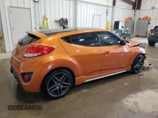 ✅ 2015 Hyundai Veloster Turbo • VIN: KMHTC6AE7FU225062 • Lot: 82557604. Wystawiony na Copart z przebiegiem 98 696 mil. Bezpłatny archiwum sprzedaży aukcyjnych z USA i szczegółowy raport historii pojazdu na DreamBid. Zdjęcie 3.