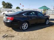 ✅ 2015 Chevrolet Impala LT • VIN: 1G1125S3XFU148427 • Лот: 70702744. Опубликован ранее на Copart с пробегом 97 058 миль. Бесплатный доступ к архиву аукционных продаж из США и подробный отчёт об истории автомобиля на DreamBid. Изображение 3.