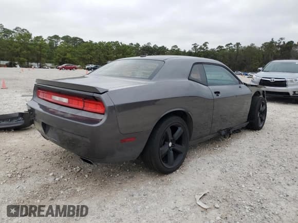 ✅ 2013 Dodge Challenger SXT • VIN: 2C3CDYAG8DH634612 • Lot: 84752434. Wystawiony na Copart z przebiegiem 206 575 mil. Bezpłatny archiwum sprzedaży aukcyjnych z USA i szczegółowy raport historii pojazdu na DreamBid. Zdjęcie 3.