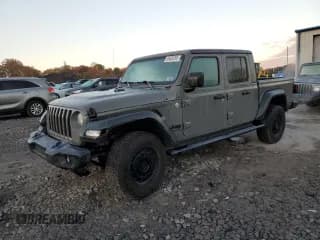 ✅ 2020 Jeep Gladiator Sport S • VIN: 1C6HJTAGXLL157395 • Lot: 89630265. Listed on Copart with 104,639 mi. Free auction sales archive from the USA and detailed vehicle history report at DreamBid. Image 1.