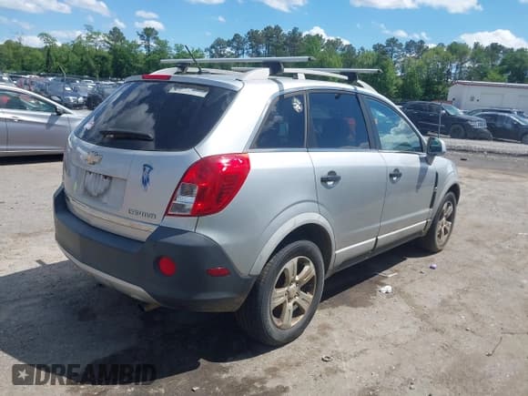 ✅ 2014 Chevrolet Captiva Sport LS • VIN: 3GNAL2EK2ES652899 • Lot: 42191815. Wystawiony na IAAI z przebiegiem 216 714 mil. Bezpłatny archiwum sprzedaży aukcyjnych z USA i szczegółowy raport historii pojazdu na DreamBid. Zdjęcie 4.