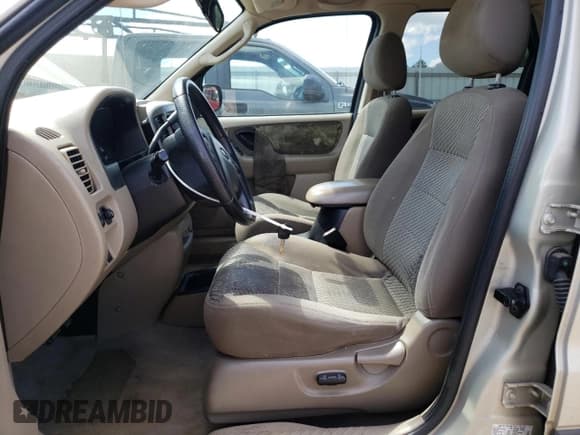 ✅ 2003 Ford Escape XLT Popular • VIN: 1FMYU031X3KD91433 • Lot: 70675795. Listed on Copart with 295,938 mi. Free auction sales archive from the USA and detailed vehicle history report at DreamBid. Image 7.