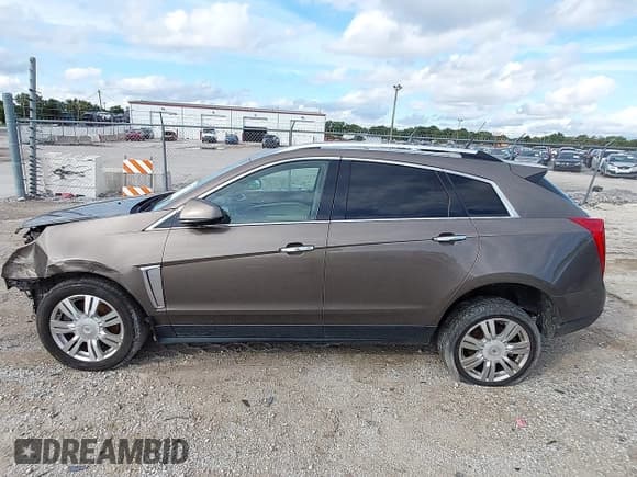 ✅ 2014 Cadillac SRX Luxury Collection • VIN: 3GYFNEE32ES587548 • Lot: 43298731. Listed on IAAI with 126,400 mi. Free auction sales archive from the USA and detailed vehicle history report at DreamBid. Image 14.