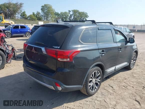 2018 Mitsubishi Outlander SE with VIN JA4AD3A31JJ004065, listed as a IAAI auction lot 43190539 with 160,381 mi miles and . Bid and sale history available at DreamBid. Image 4.
