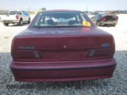 ✅ 1990 Ford Taurus • VIN: 1FACP54Y5LA145772 • Lot: 69129894. Listed on Copart with 617,051 mi. Free auction sales archive from the USA and detailed vehicle history report at DreamBid. Image 6.