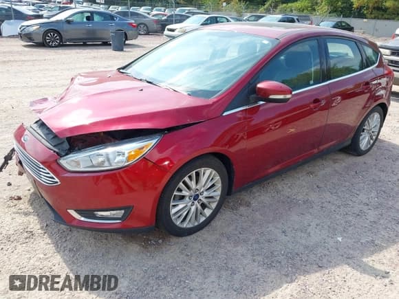 ✅ 2017 Ford Focus Titanium • VIN: 1FADP3N22HL302561 • Lot: 43252752. Listed on IAAI with 129,322 mi. Free auction sales archive from the USA and detailed vehicle history report at DreamBid. Image 4.