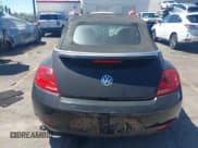 ✅ 2014 Volkswagen Beetle 1.8T • VIN: 3VW517AT6EM821755 • Лот: 42961048. Опубликован ранее на IAAI с пробегом 91 264 миль. Бесплатный доступ к архиву аукционных продаж из США и подробный отчёт об истории автомобиля на DreamBid. Изображение 17.
