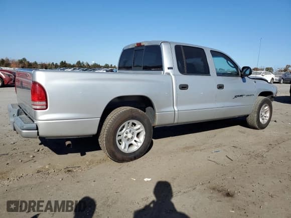 ✅ 2001 Dodge Dakota Sport • VIN: 1B7GL2AN81S211982 • Lot: 78680834. Wystawiony na Copart z przebiegiem 208 262 mil. Bezpłatny archiwum sprzedaży aukcyjnych z USA i szczegółowy raport historii pojazdu na DreamBid. Zdjęcie 3.