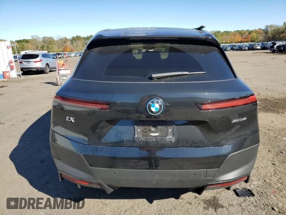 ✅ 2024 BMW iX xDrive50 • VIN: WB523CF05RCN36829 • Lot: 86242215. Listed on Copart with 12,718 mi. Free auction sales archive from the USA and detailed vehicle history report at DreamBid. Image 6.