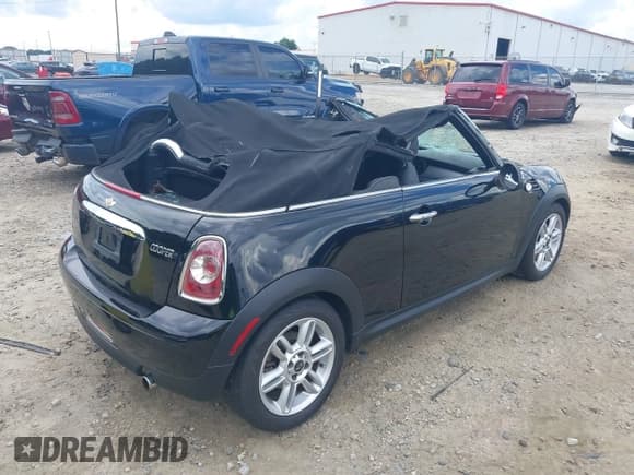 ✅ 2011 MINI Convertible • VIN: WMWZN3C55BTZ78056 • Lot: 42698584. Listed on IAAI with 145,375 mi. Free auction sales archive from the USA and detailed vehicle history report at DreamBid. Image 4.