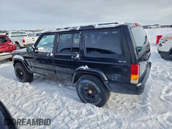✅ 1998 Jeep Cherokee Sport • VIN: 1J4FJ68S9WL150447 • Lot: 95184265. Listed on Copart with 231,976 mi. Free auction sales archive from the USA and detailed vehicle history report at DreamBid. Image 2.
