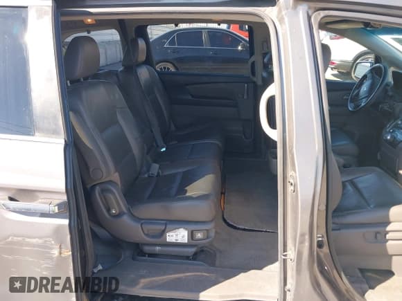 ✅ 2012 Honda Odyssey Touring • VIN: 5FNRL5H94CB106763 • Лот: 43309470. Опубликован ранее на IAAI с пробегом 154 794 миль. Бесплатный доступ к архиву аукционных продаж из США и подробный отчёт об истории автомобиля на DreamBid. Изображение 8.