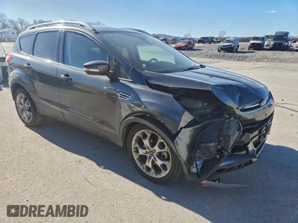 ✅ 2015 Ford Escape Titanium • VIN: 1FMCU0J98FUC32373 • Lot: 94688845. Wystawiony na Copart z przebiegiem 154 096 mil. Bezpłatny archiwum sprzedaży aukcyjnych z USA i szczegółowy raport historii pojazdu na DreamBid. Zdjęcie 4.