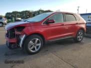 ✅ 2021 Ford Edge SEL • VIN: 2FMPK4J91MBA33702 • Lot: 82673095. Listed on Copart with 35,220 mi. Free auction sales archive from the USA and detailed vehicle history report at DreamBid. Image 1.