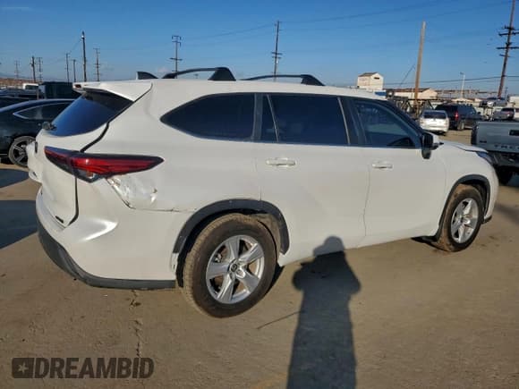 ✅ 2023 Toyota Highlander Hybrid LE • VIN: 5TDZARAHXPS521120 • Лот: 95034905. Опубликован ранее на Copart с пробегом 86 264 миль. Бесплатный доступ к архиву аукционных продаж из США и подробный отчёт об истории автомобиля на DreamBid. Изображение 3.