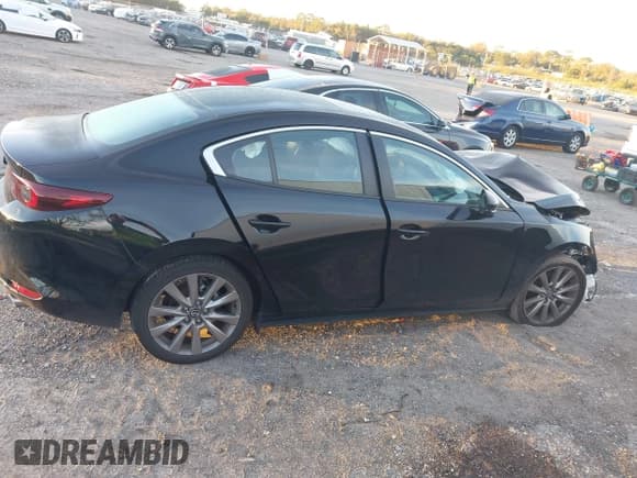 ✅ 2024 Mazda 3 S Preferred • VIN: 3MZBPACM5RM402967 • Lot: 41223664. Listed on IAAI with 12,925 mi. Free auction sales archive from the USA and detailed vehicle history report at DreamBid. Image 13.