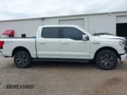 ✅ 2022 Ford F-150 Lightning Pro • VIN: 1FTVW1EL3NWG16132 • Lot: 42362459. Wystawiony na IAAI z przebiegiem 16 509 mil. Bezpłatny archiwum sprzedaży aukcyjnych z USA i szczegółowy raport historii pojazdu na DreamBid. Zdjęcie 14.