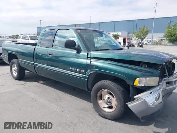 ✅ 2001 Dodge 1500 • VIN: 3B7HC13Z61G758822 • Lot: 42736366. Listed on IAAI with 114,934 mi. Free auction sales archive from the USA and detailed vehicle history report at DreamBid. Image 1.
