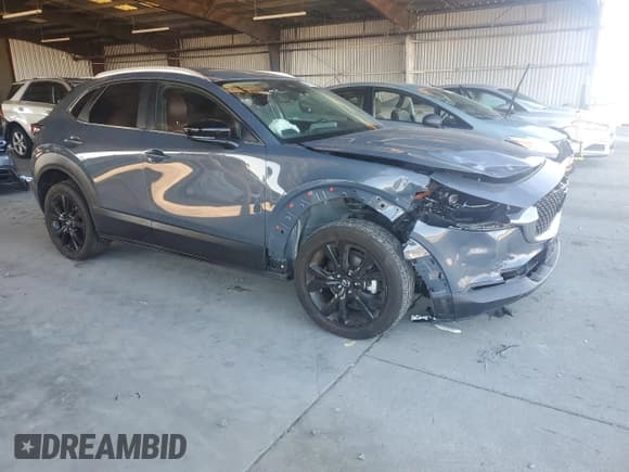 ✅ 2024 Mazda CX-30 S Carbon Edition • VIN: 3MVDMBCM1RM697400 • Lot: 89650345. Listed on Copart with 13,567 mi. Free auction sales archive from the USA and detailed vehicle history report at DreamBid. Image 4.