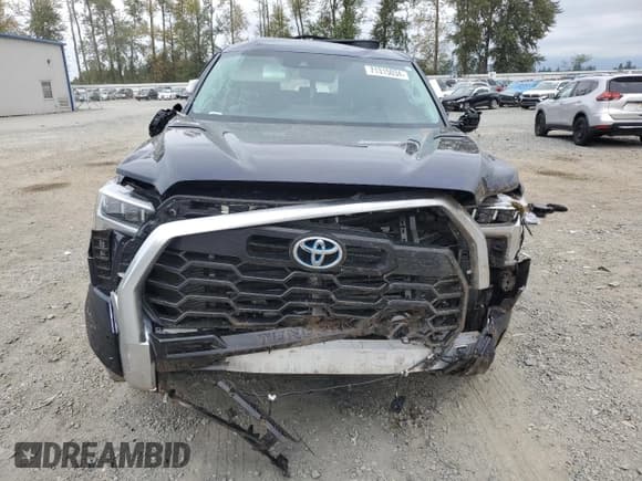 ✅ 2022 Toyota Tundra Limited Hybrid • VIN: 5TFJC5DB4NX008945 • Lot: 71315034. Listed on Copart with 10,500 mi. Free auction sales archive from the USA and detailed vehicle history report at DreamBid. Image 5.