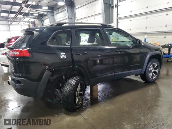 ✅ 2018 Jeep Cherokee Trailhawk • VIN: 1C4PJMBX0JD530976 • Lot: 87028435. Listed on Copart with 125,550 mi. Free auction sales archive from the USA and detailed vehicle history report at DreamBid. Image 3.
