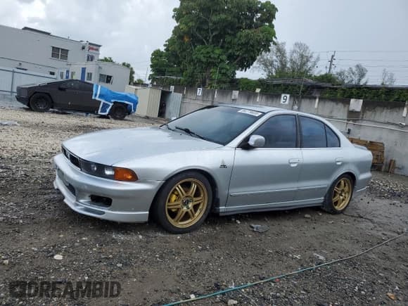 ✅ 2000 Mitsubishi Galant ES • VIN: 4A3AA46G9YE012432 • Lot: 64779835. Wystawiony na Copart z przebiegiem 193 487 mil. Bezpłatny archiwum sprzedaży aukcyjnych z USA i szczegółowy raport historii pojazdu na DreamBid. Zdjęcie 1.