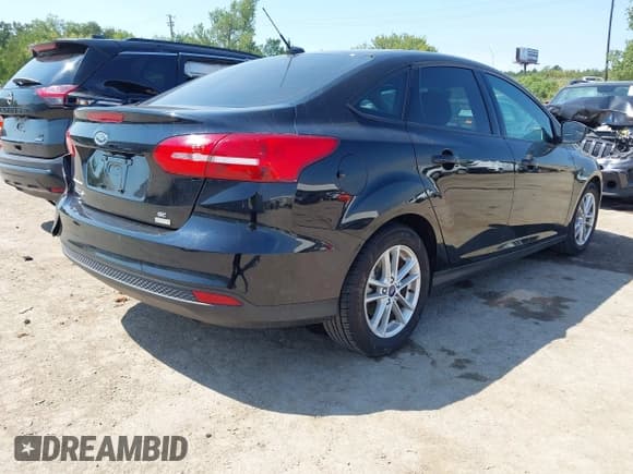 ✅ 2018 Ford Focus SE • VIN: 1FADP3FE8JL281651 • Lot: 43169650. Listed on IAAI with 69,451 mi. Free auction sales archive from the USA and detailed vehicle history report at DreamBid. Image 4.