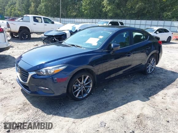 ✅ 2018 Mazda 3 Touring • VIN: 3MZBN1V35JM266399 • Lot: 43155839. Wystawiony na IAAI z przebiegiem 111 387 mil. Bezpłatny archiwum sprzedaży aukcyjnych z USA i szczegółowy raport historii pojazdu na DreamBid. Zdjęcie 18.