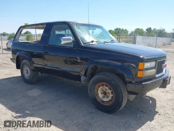 ✅ 1992 GMC Yukon • VIN: 1GKEK18K5NJ705491 • Lot: 43034704. Listed on IAAI with 268,941 mi. Free auction sales archive from the USA and detailed vehicle history report at DreamBid. Image 1.