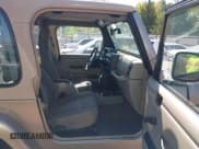 ✅ 2004 Jeep Wrangler Sahara • VIN: 1J4FA59S74P718659 • Lot: 43316154. Listed on IAAI with 144,737 mi. Free auction sales archive from the USA and detailed vehicle history report at DreamBid. Image 5.