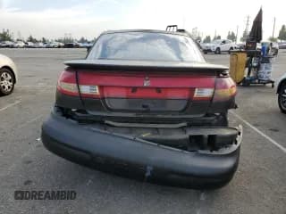 ✅ 1997 Saturn SC • VIN: 1G8ZF1286VZ350275 • Лот: 83010514. Опубликован ранее на Copart с пробегом 143 241 миль. Бесплатный доступ к архиву аукционных продаж из США и подробный отчёт об истории автомобиля на DreamBid. Изображение 6.