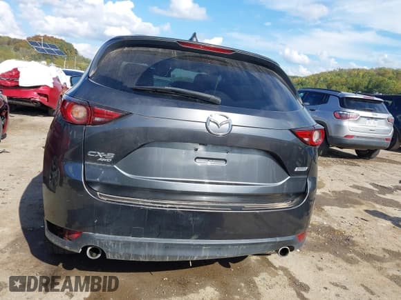 ✅ 2019 Mazda CX-5 Grand Touring • VIN: JM3KFBDM6K0570580 • Лот: 43283098. Опубликован ранее на IAAI с пробегом 260 949 миль. Бесплатный доступ к архиву аукционных продаж из США и подробный отчёт об истории автомобиля на DreamBid. Изображение 16.