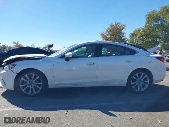 ✅ 2017 Mazda 6 Touring • VIN: JM1GL1V50H1145352 • Lot: 43468086. Wystawiony na IAAI z przebiegiem 116 204 mil. Bezpłatny archiwum sprzedaży aukcyjnych z USA i szczegółowy raport historii pojazdu na DreamBid. Zdjęcie 14.