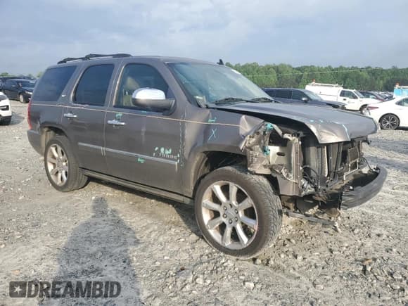 ✅ 2012 Chevrolet Tahoe LTZ • VIN: 1GNSCCE0XCR110507 • Lot: 54269535. Listed on Copart with 193,499 mi. Free auction sales archive from the USA and detailed vehicle history report at DreamBid. Image 4.