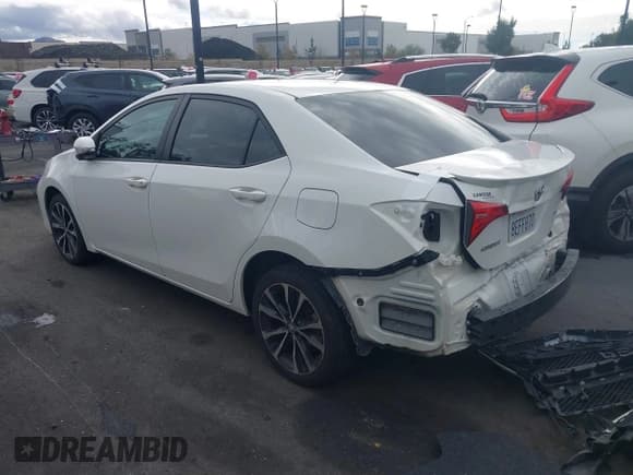 ✅ 2018 Toyota Corolla LE • VIN: 5YFBURHE8JP787045 • Lot: 43715533. Listed on IAAI with 105,003 mi. Free auction sales archive from the USA and detailed vehicle history report at DreamBid. Image 3.