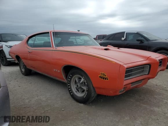 ✅ 1969 Pontiac GTO • VIN: 242379P309028 • Лот: 75516494. Опубликован ранее на Copart с пробегом 597 миль. Бесплатный доступ к архиву аукционных продаж из США и подробный отчёт об истории автомобиля на DreamBid. Изображение 4.