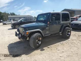 2005 Jeep Wrangler X с VIN 1J4FA39S65P325984, выставлен на аукционе Copart как лот 84242945 с пробегом 103 045 миль миль и Списание • Salvage title. История ставок и продаж доступна на DreamBid. Изображение 1.