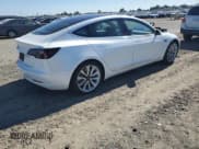 ✅ 2020 Tesla Model 3 Standard Range Plus • VIN: 5YJ3E1EAXLF806603 • Lot: 87305155. Listed on Copart with 84,335 mi. Free auction sales archive from the USA and detailed vehicle history report at DreamBid. Image 3.