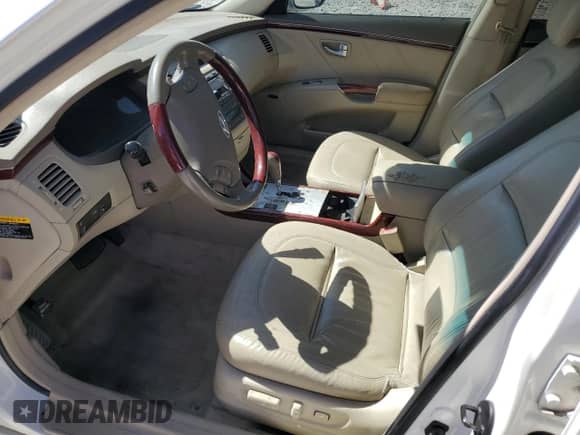 2006 Hyundai Azera SE с VIN KMHFC46F76A112099, выставлен на аукционе Copart как лот 76604094 с пробегом Не указан миль и Списание • Salvage title. История ставок и продаж доступна на DreamBid. Изображение 7.