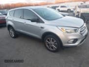 ✅ 2017 Ford Escape SE • VIN: 1FMCU9GD5HUA14443 • Lot: 43694569. Listed on IAAI with 112,952 mi. Free auction sales archive from the USA and detailed vehicle history report at DreamBid. Image 1.